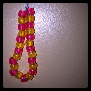 A yellow and pink braclet💕